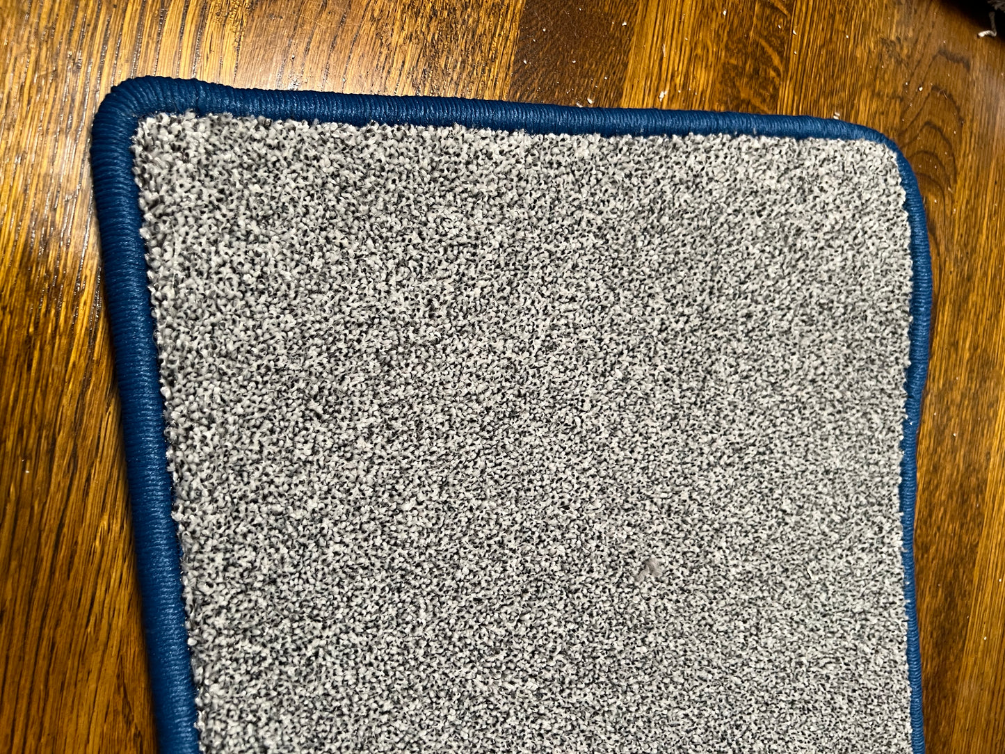 Graphite carpet runner with navy blue edging