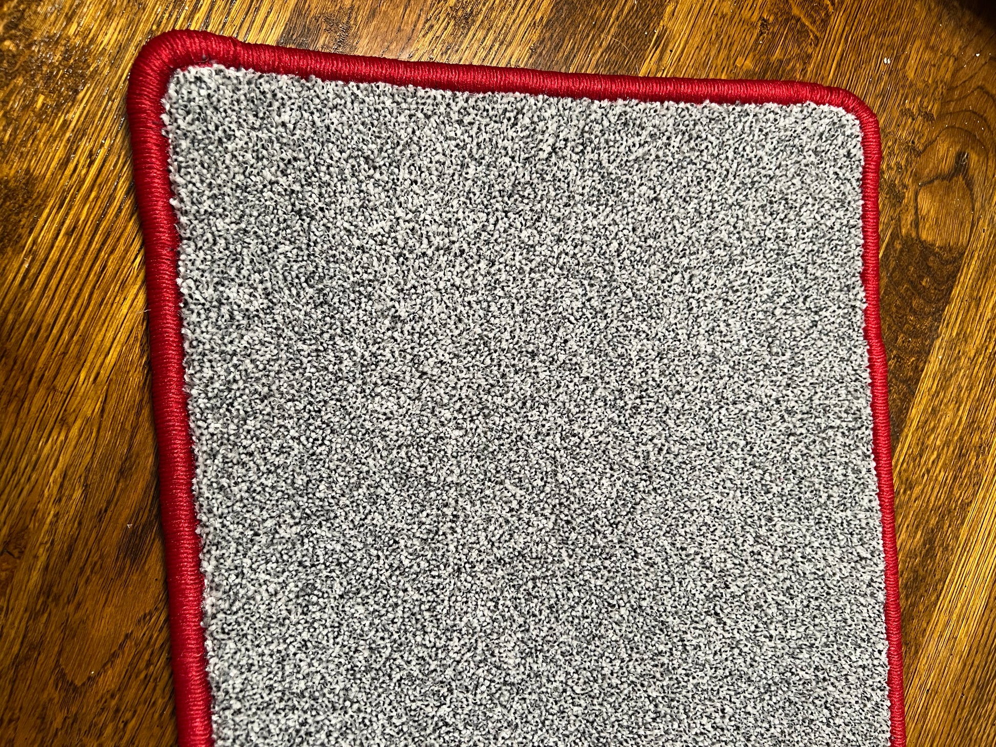 Graphite carpet runner with red edging